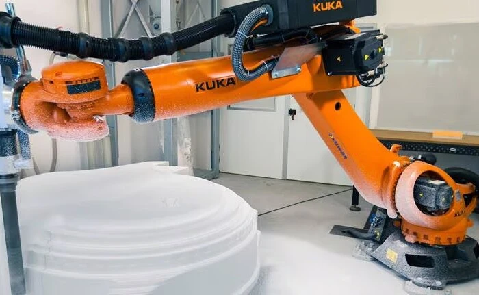 Actual machining of a film prop by a KUKA robot programmed in SprutCAM X Robot