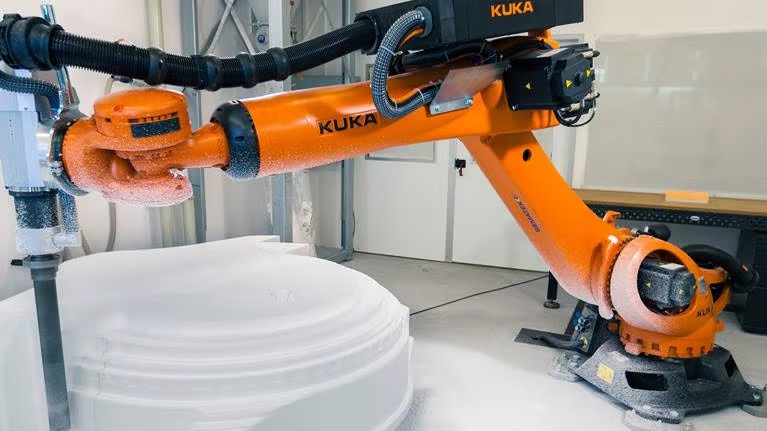Actual machining of a film prop by a KUKA robot programmed in SprutCAM X Robot